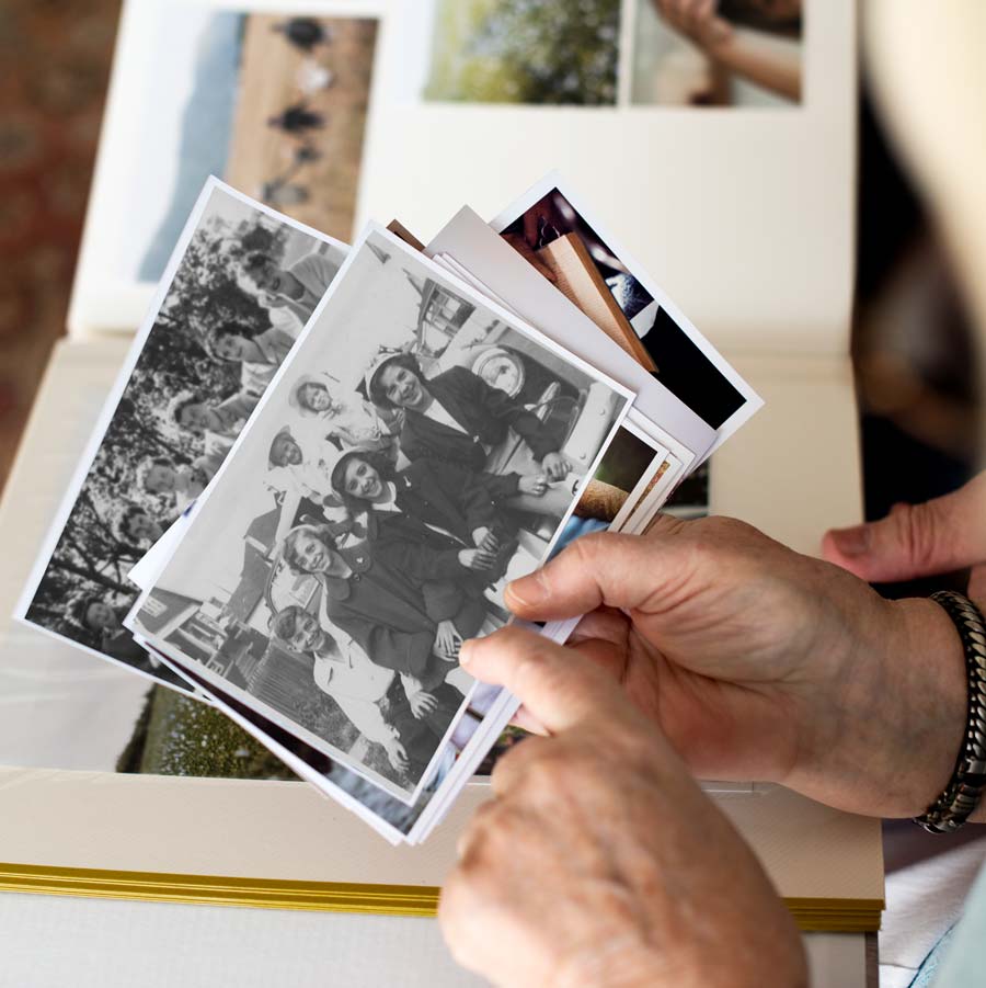 Family photos to be scanned and preserved digitially.